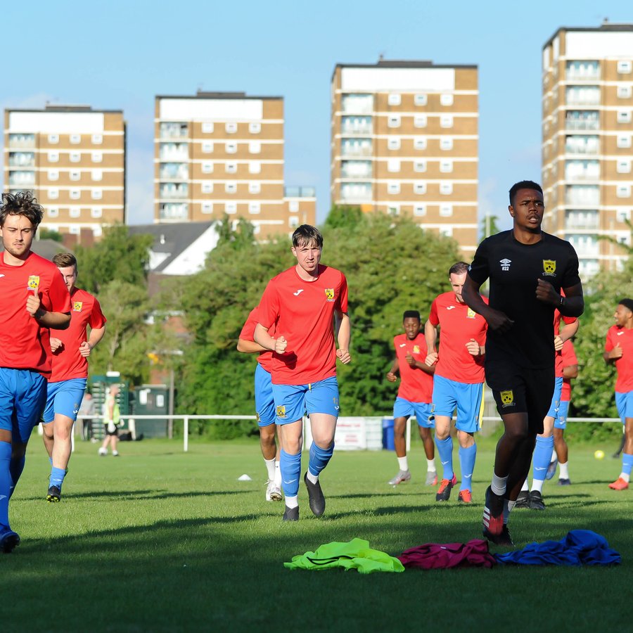 TJ leading a team warm-up session